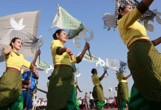 Dancers perform during Victory Day parade marking 46th anniversary in Phnom Penh Cambodia