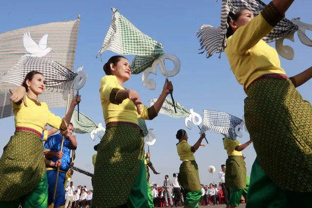 Dancers perform during Victory Day parade marking 46th anniversary in Phnom Penh Cambodia