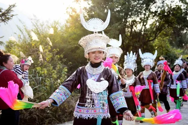 Miao ethnic group members celebrate cultural new year at Lu Sheng wind instrument festival in Guizhou China