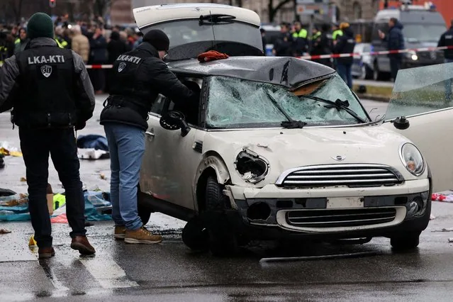 Police investigating car-into-crowd attack scene in Munich Germany February 2025