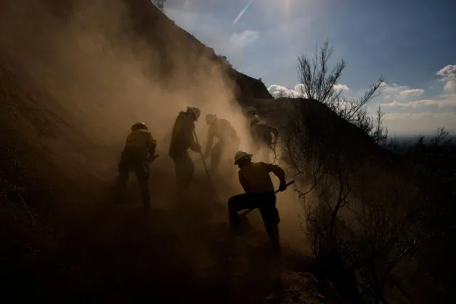 Navajo Scouts firefighters clear landslide debris while battling Eaton Fire Altadena California January 2025
