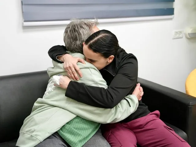 Emily Damari embraces her mother Mandy near kibbutz Reim Israel after Hamas release January 2025