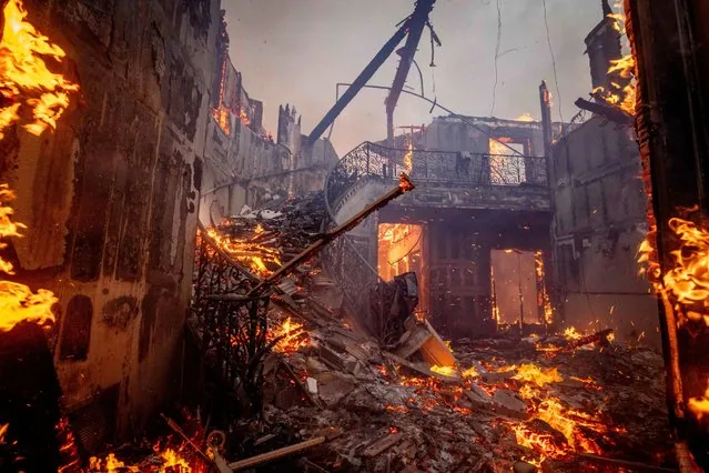 Palisades Fire burns residential home in Pacific Palisades neighborhood Los Angeles January 2025