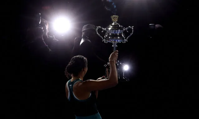 Madison Keys holding Daphne Akhurst Memorial Cup after winning 2025 Australian Open final