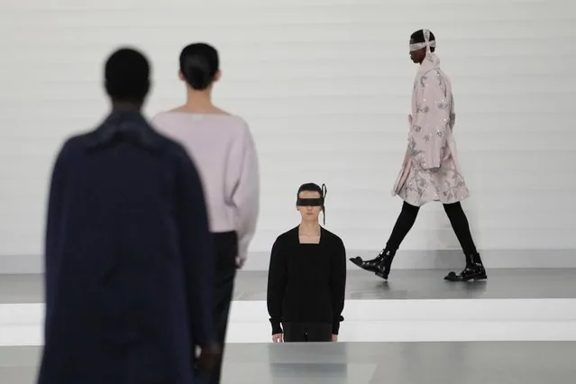 Male model wearing Dior Homme Fall-Winter 2025-2026 collection at Paris fashion show