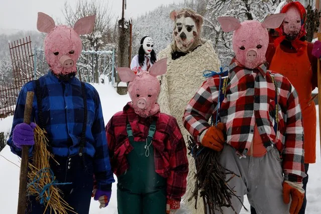 Masked carnival revelers wait for parade in Vevcani North Macedonia Julian New Year January 2025