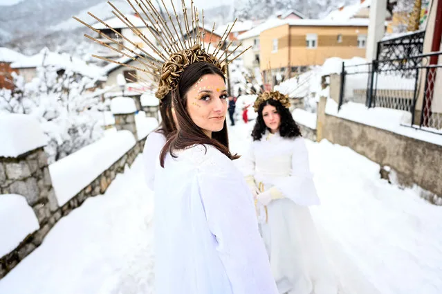 Revelers in costumes during carnival celebration in Vevcani village North Macedonia January 2025