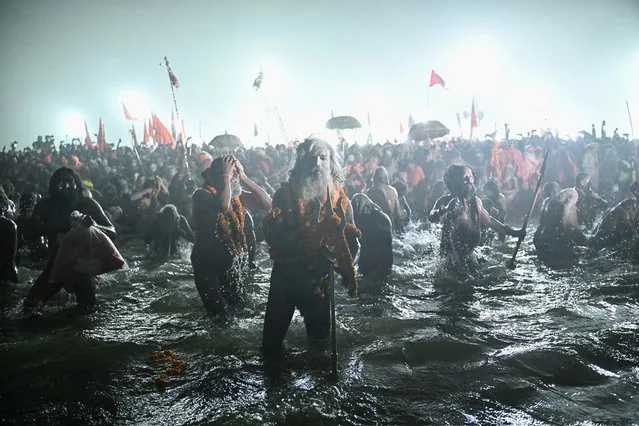 Hindu sadhus perform royal bath Shahi Snan at Maha Kumbh Mela Prayagraj India January 2025