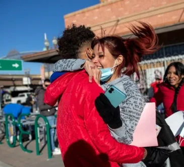 Venezuelan migrants Daniela Medina and Oldris Rodriguez embrace after crossing into El Paso Texas 2025