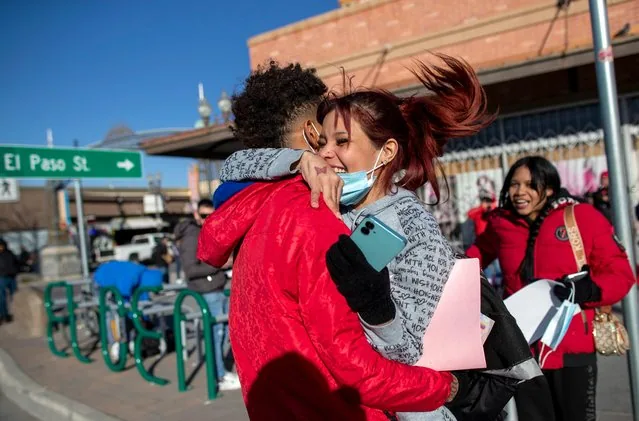 Venezuelan migrants Daniela Medina and Oldris Rodriguez embrace after crossing into El Paso Texas 2025