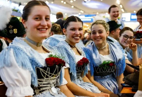 People in traditional clothes at International Green Week agriculture fair Berlin 2025