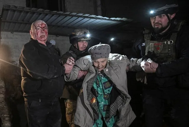 Police evacuate elderly woman from missile-struck building in Zaporizhzhia Ukraine