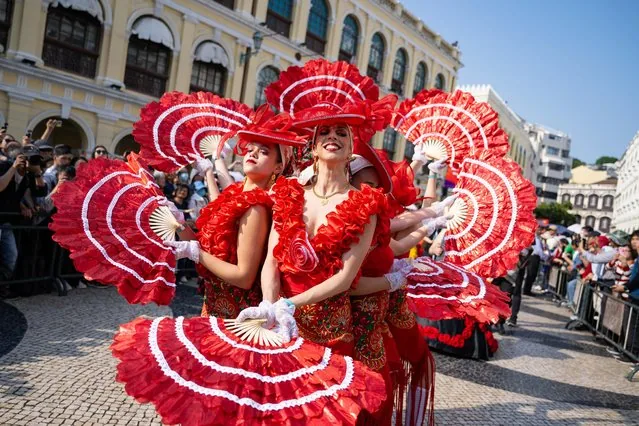 Participants marching in the 2025 Macao International Parade celebrating return anniversary