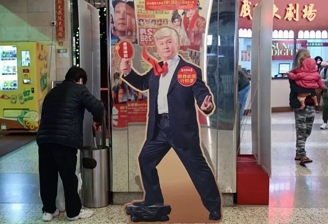 Promotional cutout of Hong Kong actor as Trump for satirical play at Sunbeam Theatre