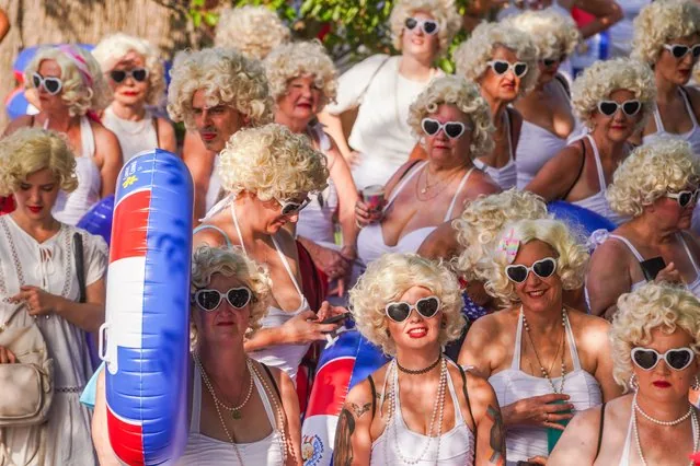 Hundreds of Marilyn Monroe lookalikes swimming in Adelaide Australia for cancer charity fundraiser