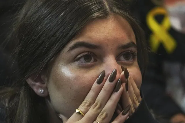 A woman reacts emotionally watching Sagui Dekel Chen released from Hamas captivity Israel