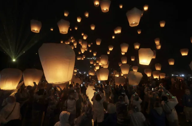 Sky lanterns released during traditional Lantern Festival Pingxi district New Taipei City Taiwan