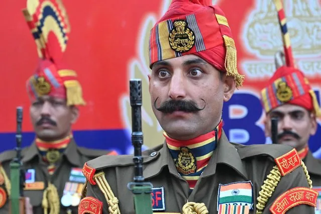 Indian BSF soldiers perform flag hoisting ceremony at Wagah border post Republic Day 2025