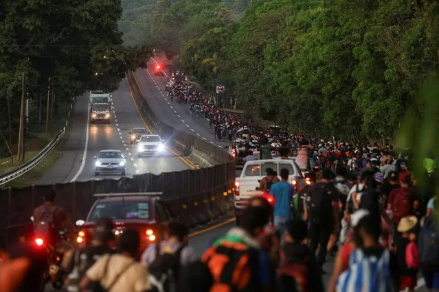Migrant caravan walking toward US border through Huehuetan Mexico January 2025