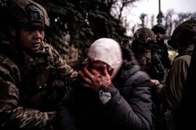 Ukrainian soldiers carry drone-injured woman to hospital in Pokrovsk Donetsk Oblast 2025