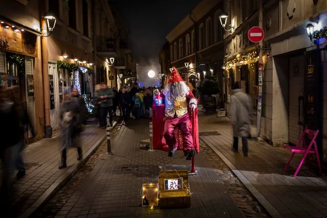 Street artist performing in the Old Town of Vilnius Lithuania January 2025
