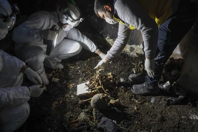 White Helmets collect human remains from Assad regime victims in Sbeneh Syria January 2025