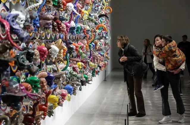 Visitors view Era of Deluge installation at Ahmet Gunestekin Lost Alphabet exhibition Istanbul