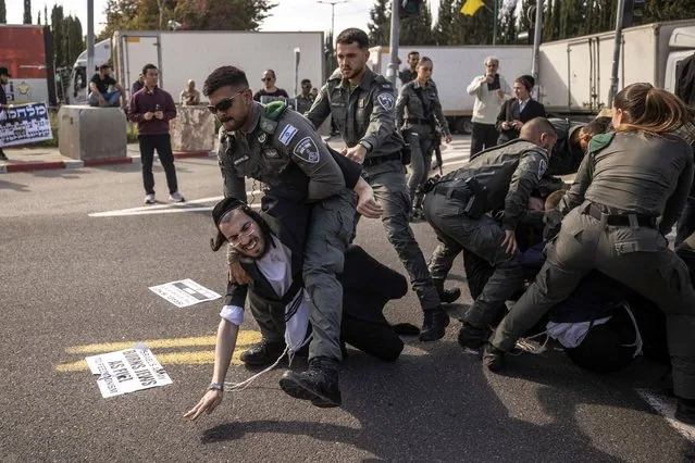 Ultra-Orthodox Jewish Haredim blocking a street in Tel Aviv protesting conscription 2025
