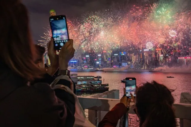 Fireworks lighting up Victoria Harbour Hong Kong on second day of Lunar New Year