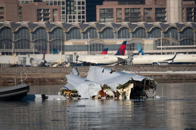 US Coast Guard aerial view of flight 5342 wreckage in Potomac River Washington