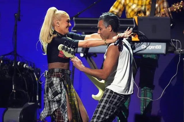 Gwen Stefani and Tony Kanal of No Doubt performing at FireAid benefit concert Inglewood