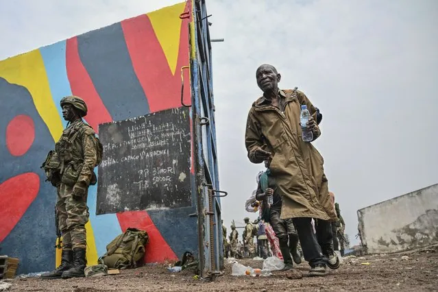 Congolese soldiers surrendering to M23 rebels boarding trucks in Goma DRC January 2025